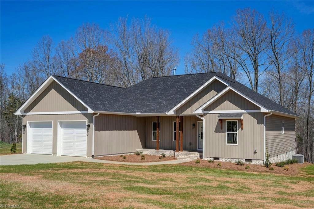 323 CHANEY LOOP, STONEVILLE, NC 27048, photo 1 of 46